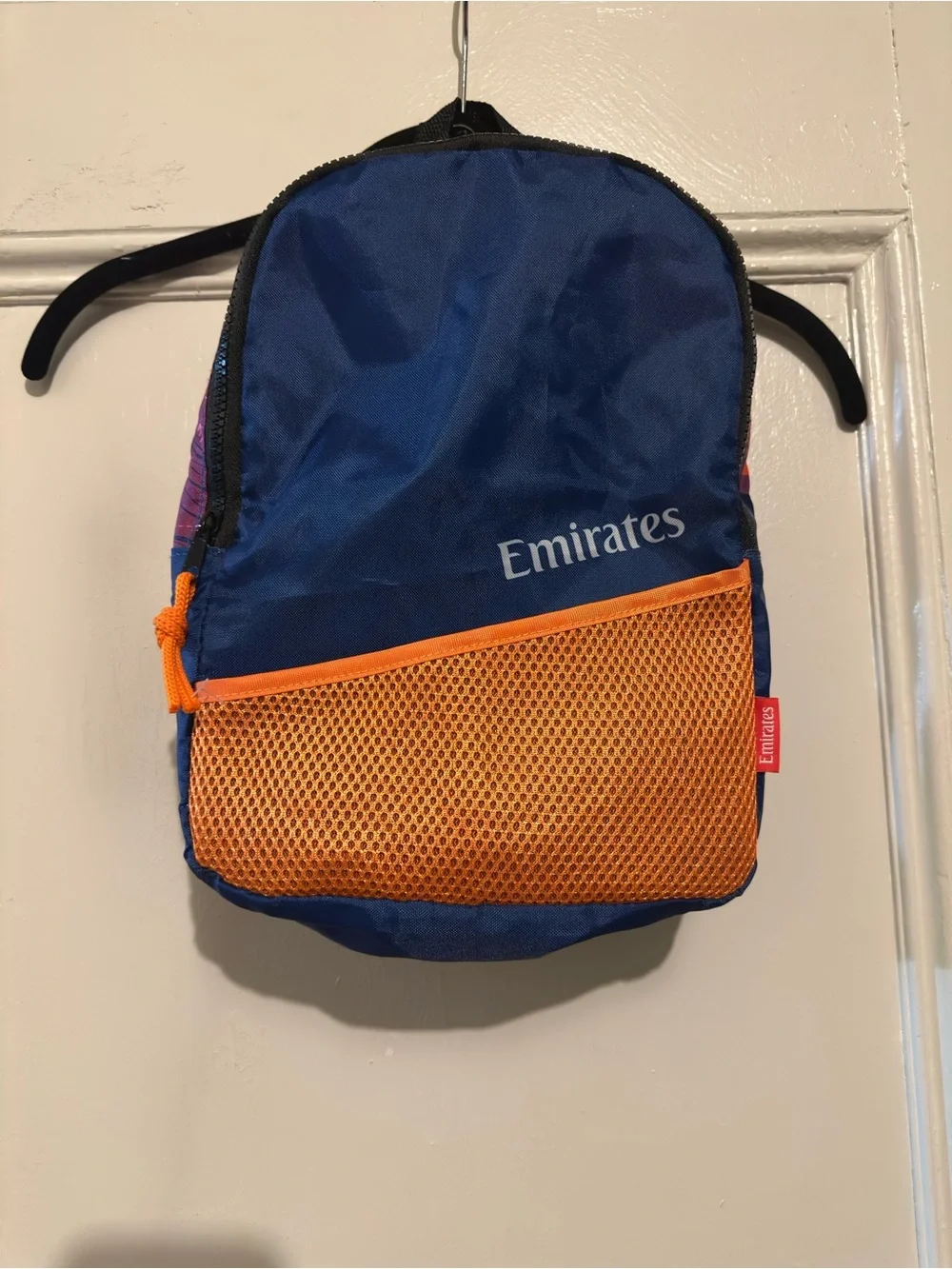 Like New Emirates Blue and Orange Kid’s Backpack. 13.5”L x 11.5”W.